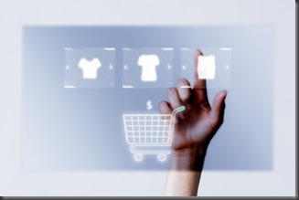 Person adding clothes to cart closeup for online shopping campaign